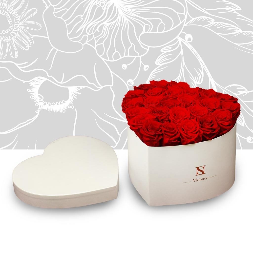 Heart-shaped flower box and red roses