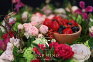 Basket of seasonal flowers and fruits