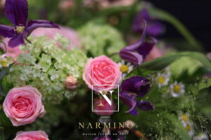 Small basket of pink seasonal flowers